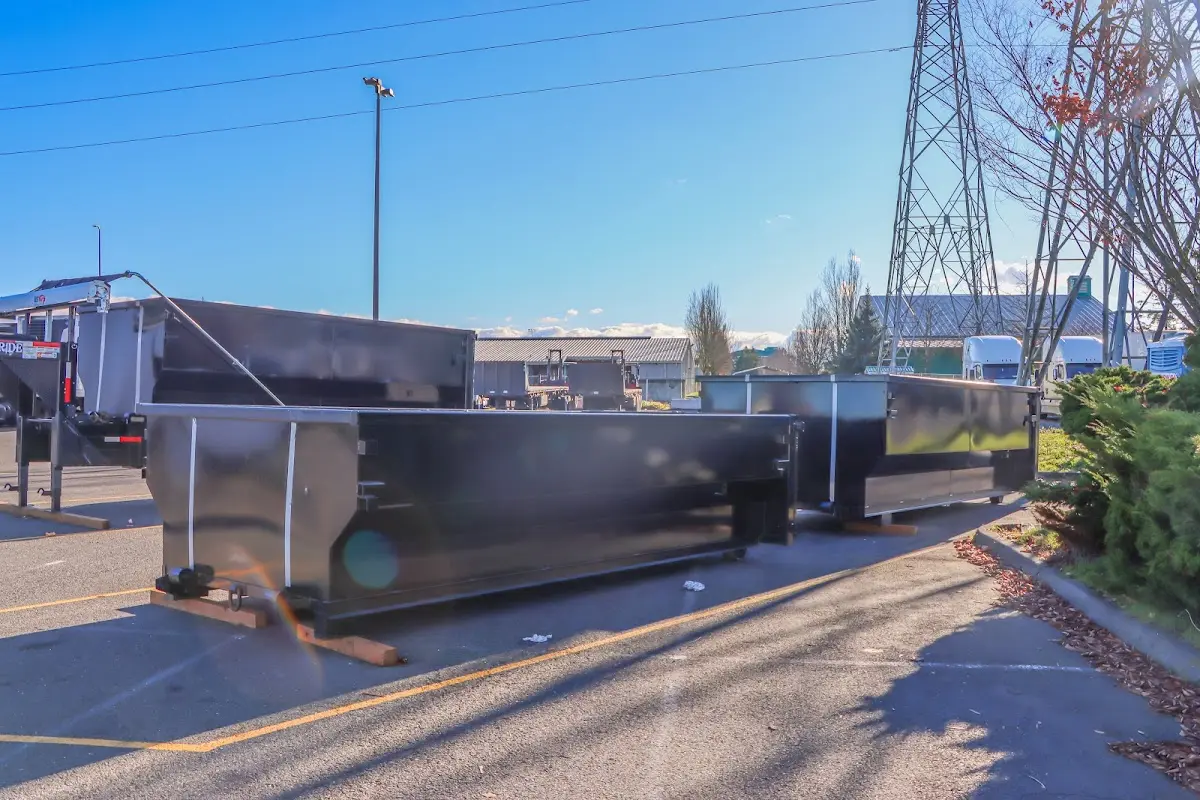 Roll-off dumpster ready for waste disposal at job site for Construction Dumpster Rental in Londonderry